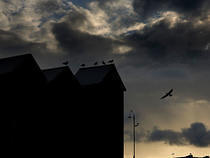 Net Huts Moody Sky